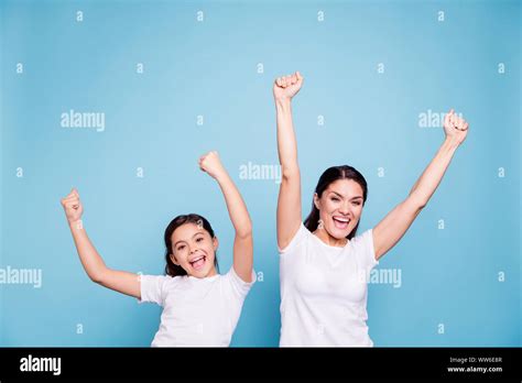 Close Up Photo Cheer Two People Brown Haired Mum Small Little Daughter Hands Arms Air Glad Yell