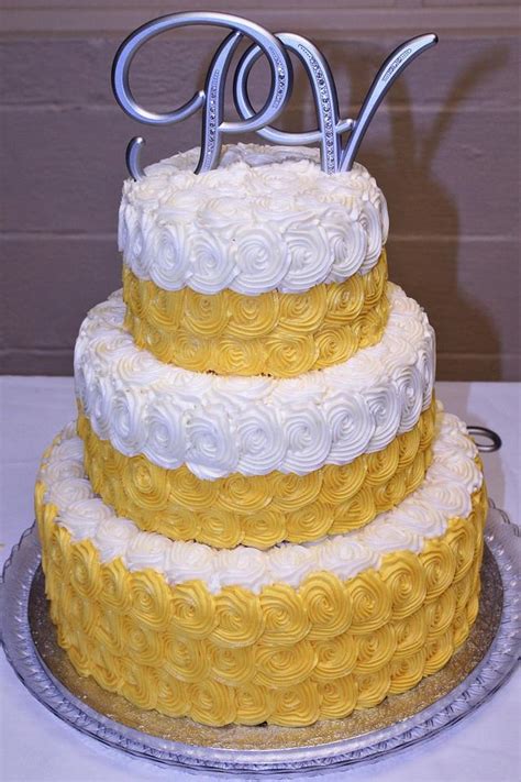 Yellow And White Rosette Wedding Cake And Sheet Cake Cake