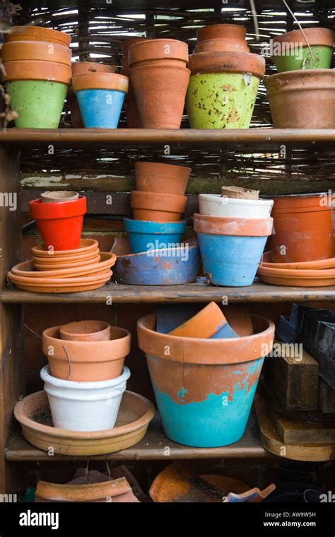 Terracotta Pots Stacked Up On A Shelf Stock Photo Alamy