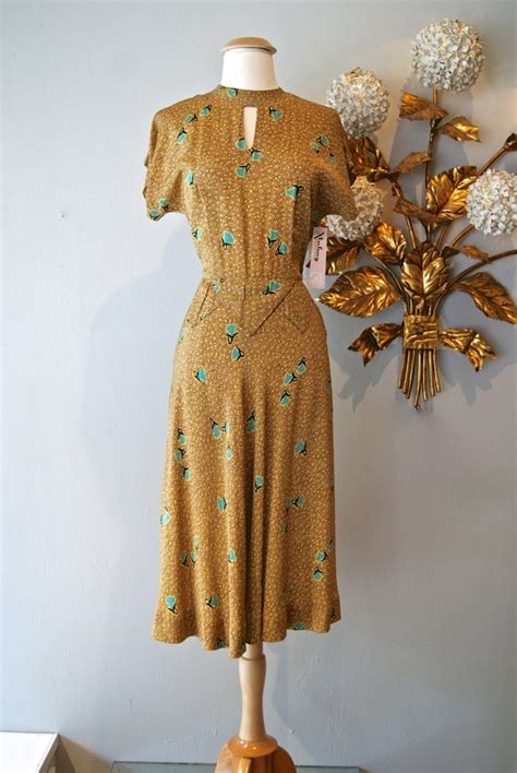 40s Dress Vintage 1940s Gold And Turquoise Sex Retary Dress