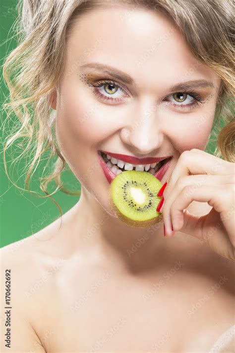 Fruit Kiwi Series Closeup Of Sensual And Sexy Naked Caucasian Model With Teeth Diastema Posing