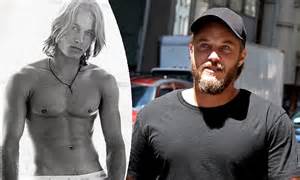 travis fimmel sports rounder figure compared to his calvin klein days daily mail online