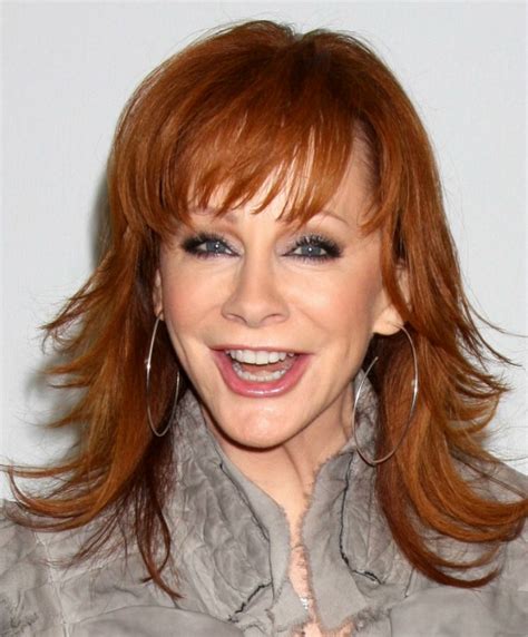 Reba Mcentire Long Chiseled Hairstyle For 50 Plus Redhead Women