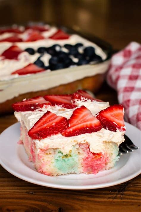 Once the cake has cool, use the bottom of a wooden spoon to poke 20+ holes in the cake. Flag Decorated Jello Poke Cake - Vintage Recipe Tin