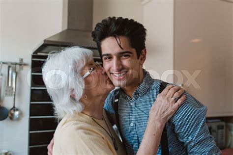 Grandmother Kissing Grandson Stock Image Colourbox