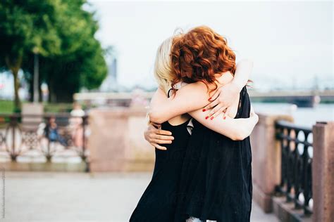 Two Best Friends Hugging Each Other By Stocksy Contributor Michela