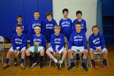 Some Players From The Fourth Grade Boys Tournament Team Posing For A
