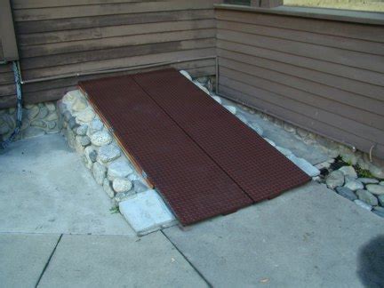 Primed steel replacement cellar door for sloped foundation type br door from bilco is designed for installation type br door from bilco is designed for installation on sloped sidewalls of brick, stone, block or poured concrete, which are generally found on older homes throughout the country. Lawrence Turner Construction - Recent projects