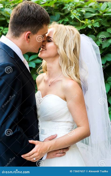 The Bride And Groom Kiss At The Camera Stock Image Image Of Husband