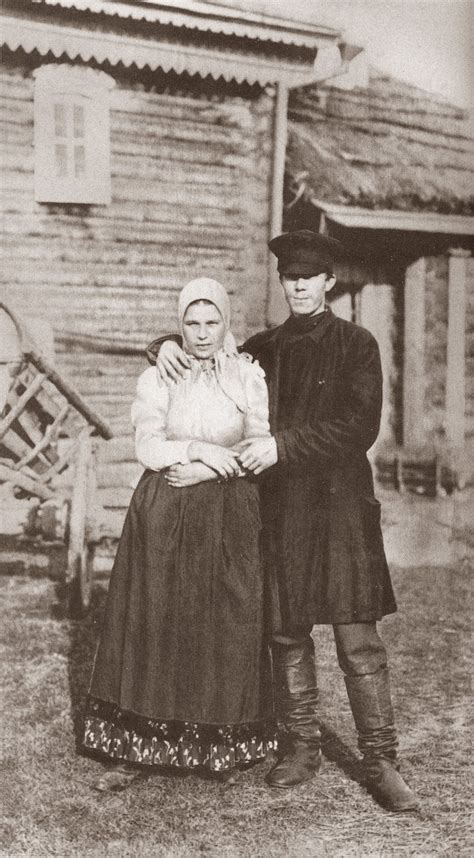 russian peasant married couple wearing traditional casual dresses late 19th early 20th