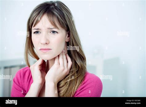 Woman With Sore Throat Stock Photo Alamy