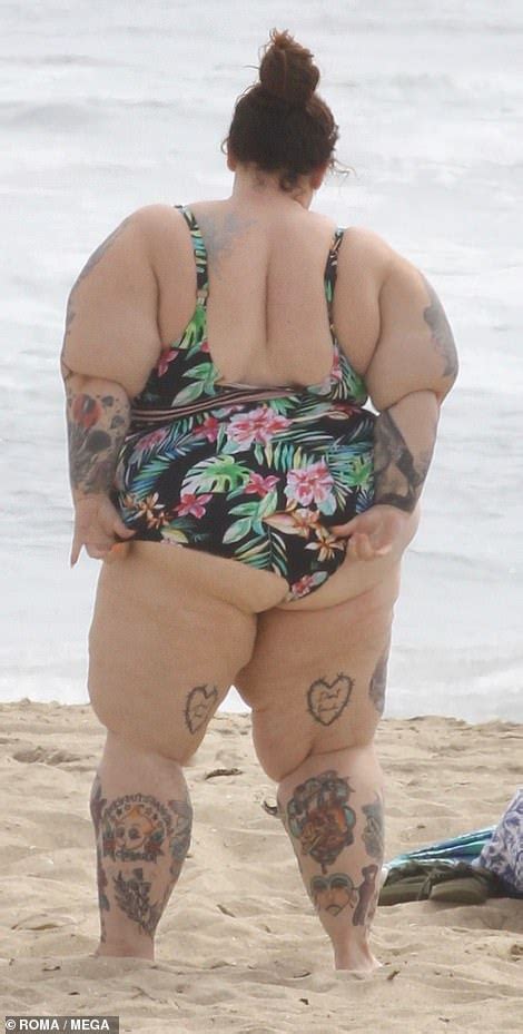 Plus Size Model Tess Holliday Slips Into A Plunging Swimsuit As She Frolics In The Waters At