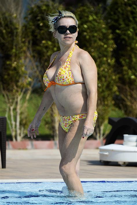 Tina Malone Looks Happier Than Ever As She Sunbathes Round The Pool In