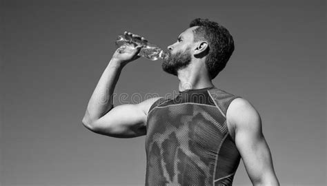 Athletic Man Drinking Water Because Of Thirst After Training Sport And