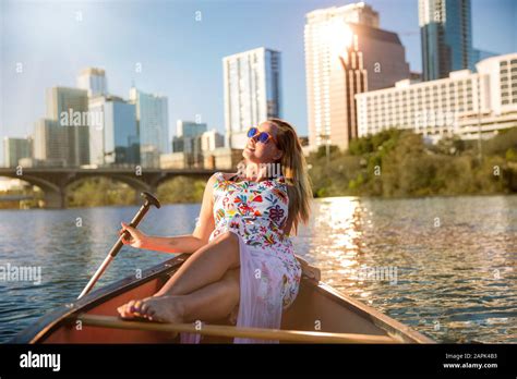 Travel And Leisure Commercial Model Woman On Canoe Boat Kayak Relaxing