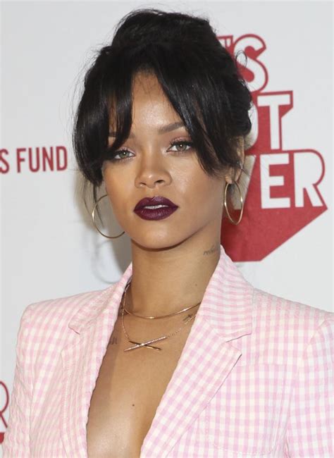 The fun part is that the tattoo is visible only when she rihanna has placed the goddess isis on her chest in memory of her grandmother. : Rihanna goes topless underneath a suit jacket, shows off ...