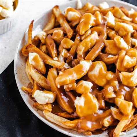 Montreal's version of loaded fries.golden french fries,delicious cheese curds topped with montreal signature gravy and toppings. Poutine Near Me / 9 Places To Get Poutine In Calgary If ...