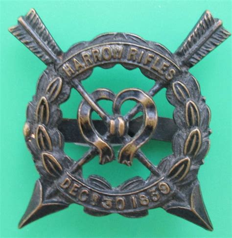 A Harrow Rifles Officers 1st Pattern Cap Badge