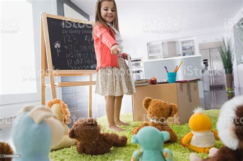 Girl Pretending To Be Teacher Stock Photo Download Image Now 6 7