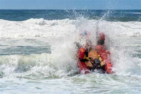 Surf Rescue Life Savers Boat Jumping On The Waves At Wanda Beach Nsw