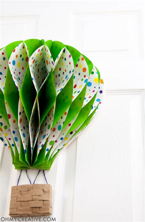 Maybe you would like to learn more about one of these? DIY Hot Air Balloon Decor - Oh My Creative