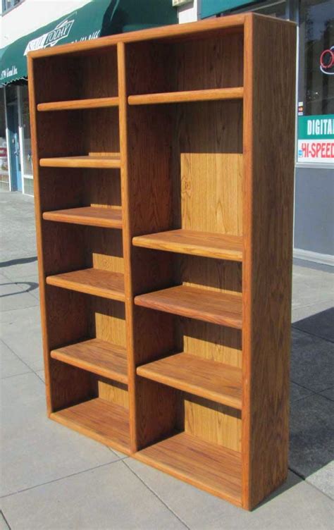 Uhuru Furniture And Collectibles Sold Tall Oak Double Bookcase 60