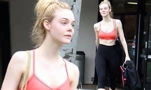 Elle Fanning Flashes Toned Torso In Orange Sports Bra Daily Mail Online