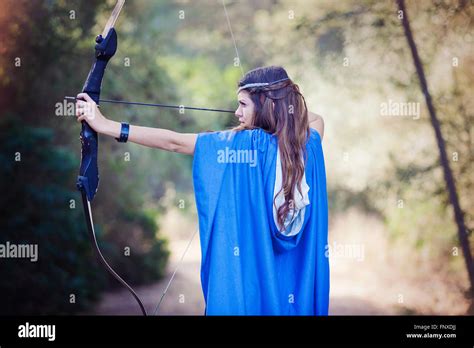 Woman With Bow And Arrow Stock Photo Alamy