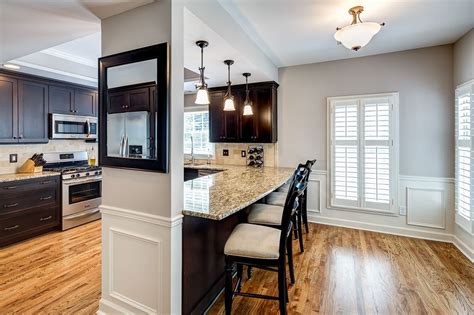 Use a row of columns to signal a level change. Home Improvement Archives | Kitchen columns, Kitchen remodel, Kitchen decor styles