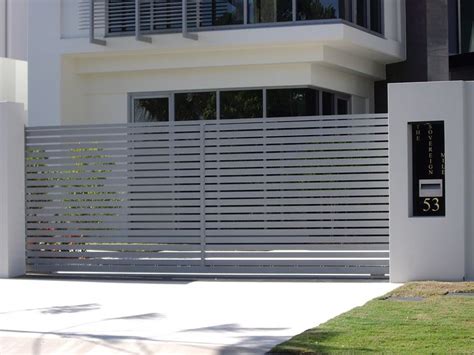 Try to blend in unobtrusively with its surroundings. modern driveway gates - Google Search | Entrance gates design, House gate design, Gate design