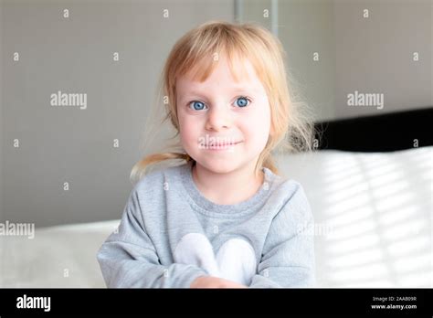 Close Up Portrait Of 3 Years Old Beautiful Girl Blonde Hair Big Blue