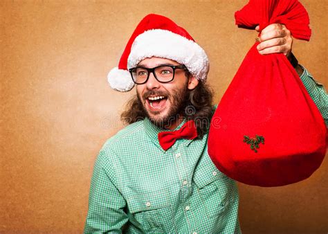 Hipster Style Santa Claus With The Bag Of The Presents Stock Photo