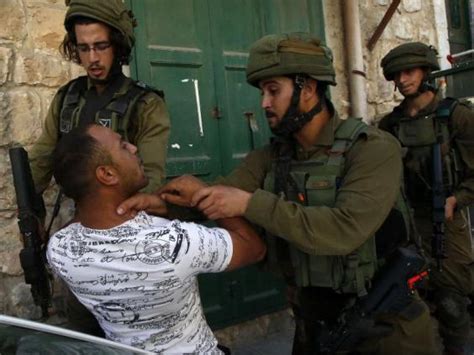 Israeli Soldiers Photographed Beating Palestinian In West Bank The