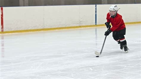 Slow Motion Tracking Of Novice Ice Hockey Forward Tricking Opposite
