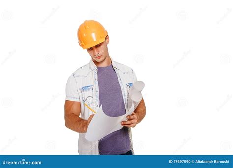 Construction Engineer Looking At The Blueprint Isolated On White