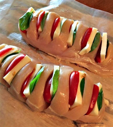 Stack the roasted red pepper, basil, and 1 slice of the mozzarella on the bottom side of the chicken. Hasselback Chicken Stuffed with Mozzarella, Tomato and ...