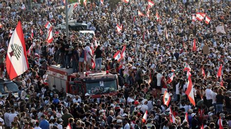 Thousands Of Lebanese Stage Protests On First Anniversary Of Beirut