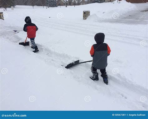 Two Boys Shoveling Snow Editorial Photo Image Of Young 50567381