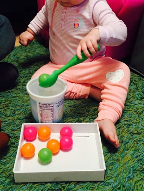 Fine Motor Transferring With Balls A Container And An Ice Cream