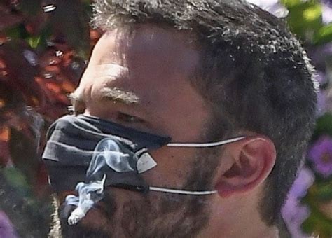 Heres Ben Affleck Casually Smoking A Cigarette Through A Ppe Mask