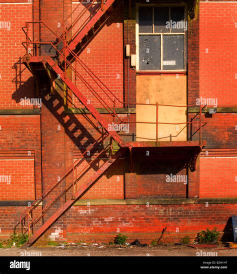 Rusty Old Fire Escape Stairs On Warehouse Stock Photo Alamy