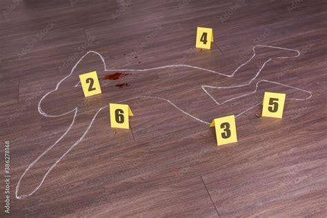 Crime Scene With Chalk Outline Of Human Body Blood Bullet Shells And