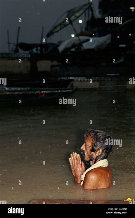 praying pilgrim ganges river dasaswamedh ghat varanasi benares uttar pradesh india stock