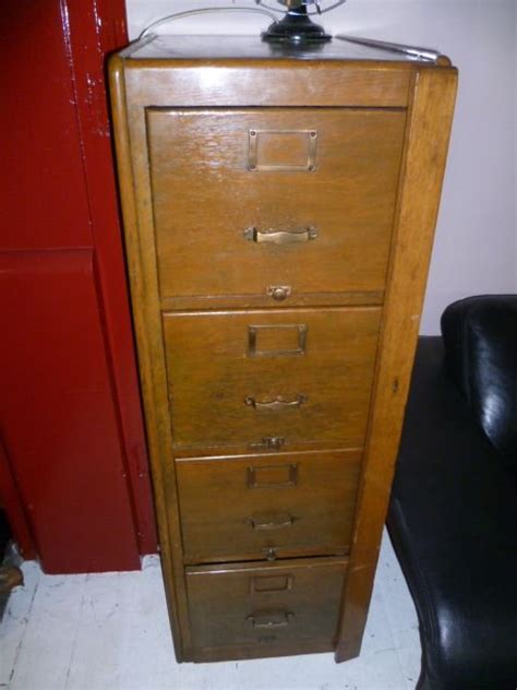 Dark oak finish with brass pulls. Vintage 1930s Oak Filing Cabinet | 143850 ...