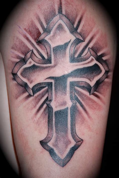 You can get a cross tattoo on finger or cross tattoos on wrist. Grey shaded 3d cross tattoo for men half sleeve