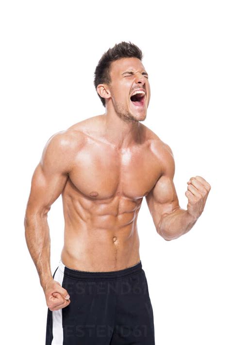 Screaming Shirtless Muscular Man In Front Of White Background Stock Photo