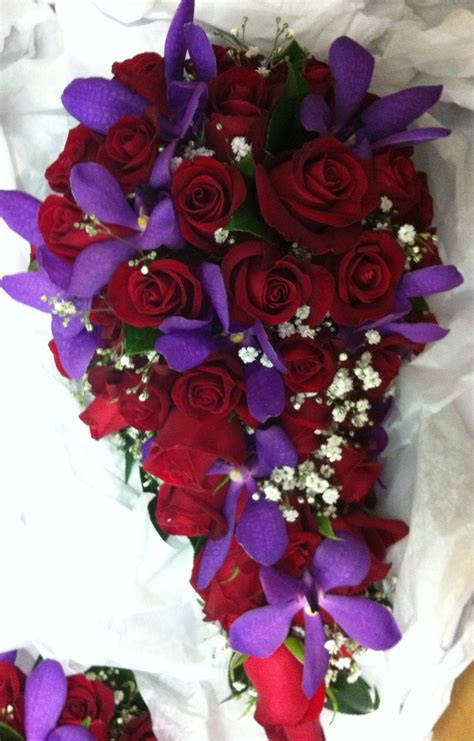 Teardrop Bouquet Of Red Roses Purple Lisianthus And Babies Breath In