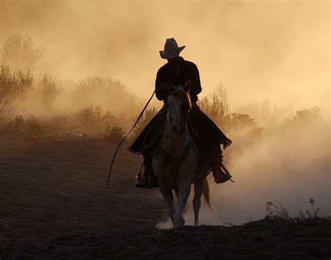 Sunset Cowboy Photograph By Joanne Mccubrey