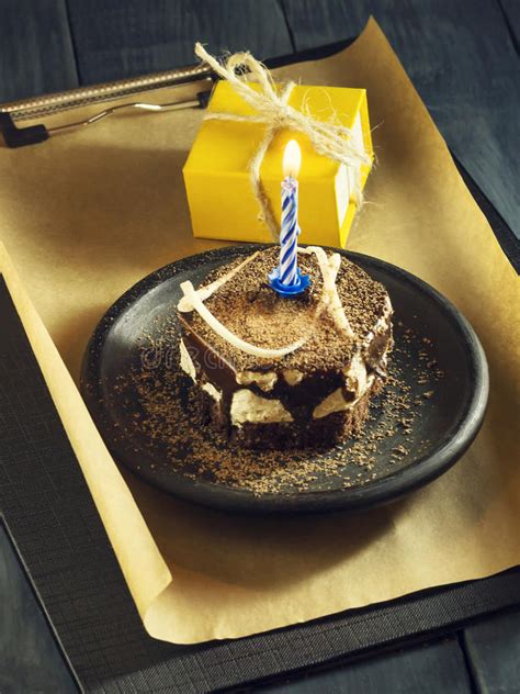 Handmade, beautifully gift wrapped, and downright delicious. Chocolate Cake With A Candle And Gifts.Happy Birthday ...