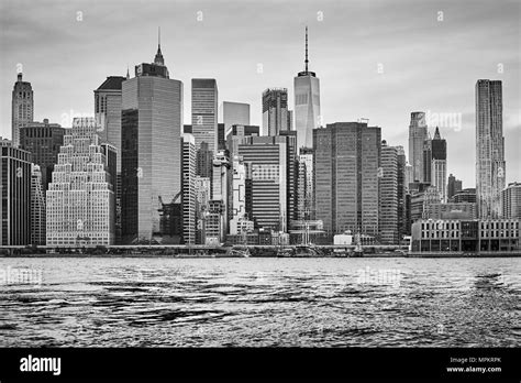 Black And White Picture Of The Manhattan Skyline At Sunset New York